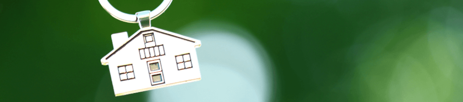 It's a key ring with a house on it. 